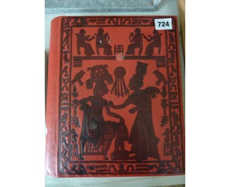 An album containing 1920s paintings on fabric panels including portrait studies, floral subjects, hounds and other dogs, etc 