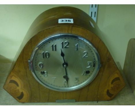 An Art Deco walnut and marquetry inlaid mantel clock with chromium dial and numerals, with Westminster/Whittington/silent chi