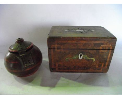 A good quality Regency period tea caddy, principally in burrwood veneers with satinwood banded inlaid borders and further mot
