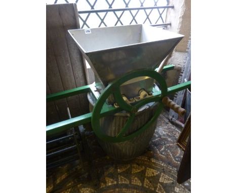 A vintage galvanised dolly tub together with an old draining board, cast iron hose reel and a hand wheel operated masher with