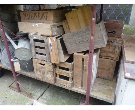 A quantity of mainly vintage wooden crates of varying size, some bearing printed lettering advertising R White's, Taunton Cid
