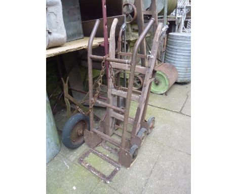 Three vintage sack trucks one with ashwood shafts 