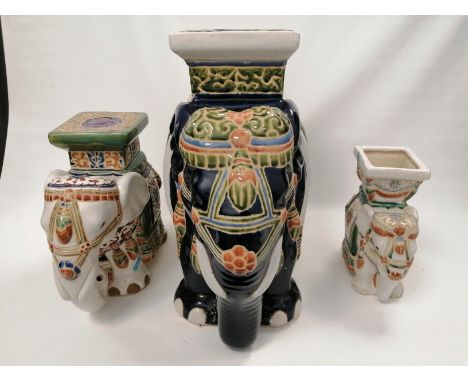 A graduated set of three ceramic elephants,  the tallest 40cm and possibly a garden seat (3) 