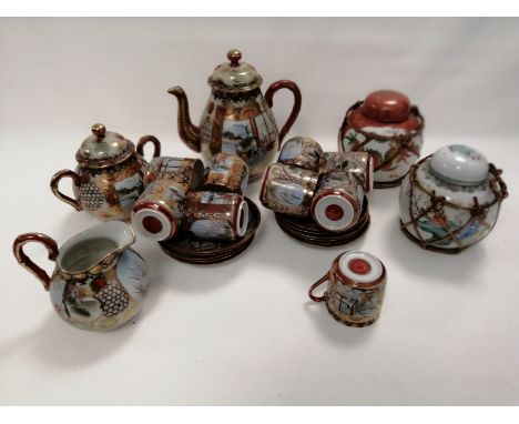 A pair of 20th Century Chinese covered ginger jars,  the first with overglaze decoration of children playing executed in fenc