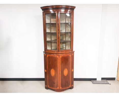 Edwardian mahogany glazed corner cupboard,  with decorative border and central inlay, split glazed doors, internal vertical l