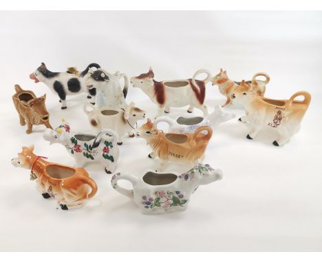 A ceramic cow creamer collection,  to include a blue and white example by Burleigh in the 'Asiatic Pheasant' pattern, a West 