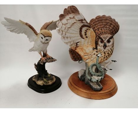A Franklin Mint bisque porcelain figure of an owl confronting a snake,  the base with factory marks 'The Eagle Owl Franklin M