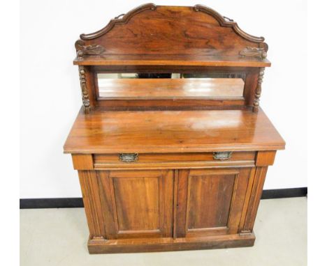 A Victorian walnut mirror backed chiffonier, shaped back with shelf supported by two turned supports, long frieze drawer abov