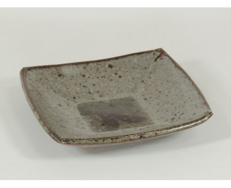 Janet Leach (1918-1997) a square stoneware bowl,  with ash glazed interior and bisque base with impressed monograms, diameter