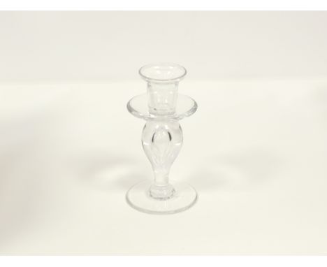 A St Louis glass candlestick with a stem of inverted tear drop shape,   the bowl raised on a circular support, the base with 