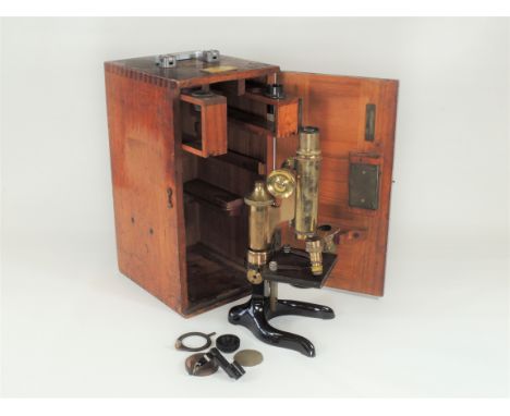 An Ernst Leitz Wetzlar early 20th Century mahogany cased brass and black lacquered microscope,  model no.122732, the case wit