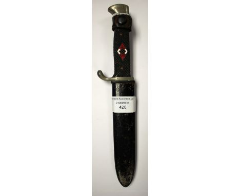 Third Reich Hitler Jugend dagger and scabbard. Transitional markings to blade with Carl Eikhorn trademark and RZM. No motto t