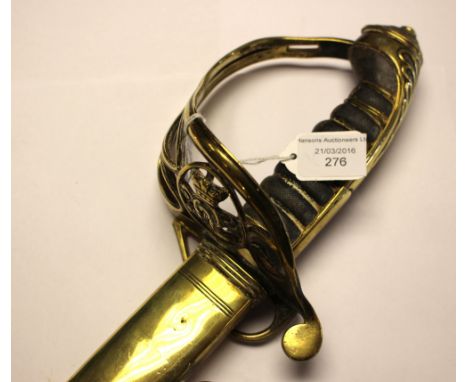 A Victorian Army Officers Sword. Shagreen covered grip. With leather scabbard with brass mounts.