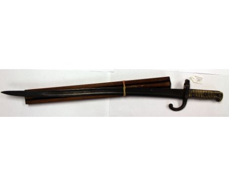 French 1866 pattern Chassepot bayonet, minus scabbard, with a wooden ledger reader 