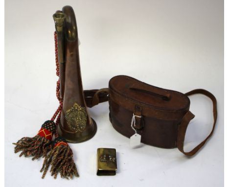 A bugle with an Argyle and Sutherlands cap badge affixed, a pair of 1917 dated British military issue binoculars Prismatic No