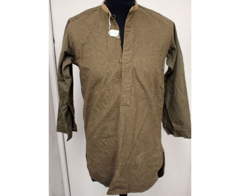 WW2 British Other Ranks collarless wool shirt. Size 4. Made by "Faulat Factory, Belfast" One button missing from cuff.