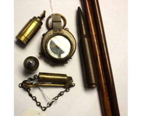 Lot:WW2 British compass (cracked glass) WW2 US .50 cal round (INERT) headstamp "LS 43"and a Brass Trench Art Cigarette lighte