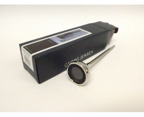 A Georg Jensen boxed wine thermometer designed by Thomas Sandell.
