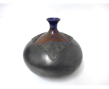 MYRA WISHART (XX/XXI) A raku pottery large bulbous vase with Celtic knot detail. Burnished bronze and blue colours. Labelled.