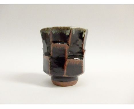 PHIL ROGERS (1951-2020) A studio pottery Yunomi with Tenmoku glaze, impressed potters seal, originally purchased from Goldmar