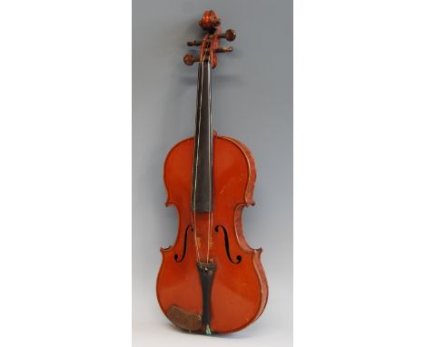 A late 19th century French violin, having a two piece maple back, with ebony finger board and rosewood pegs, bearing a label 