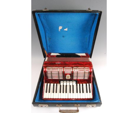 A Firotti paino accordion, in fitted case.In working order.Bellows good, no holes.All keys and buttons good.All leather good.