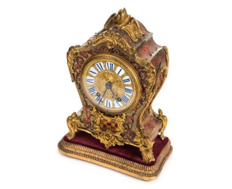 *Mantel Clock. A 19th century Boulle work mantel clock, circa 1870,  inlaid with gilt metal rococo mounts, the white enamel d