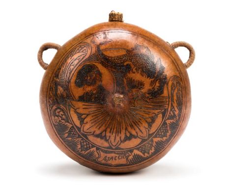 *Scrimshaw Flask. A Corsican scrimshaw flask, probably 19th century,  of circular form carved 'Ajaccio', with figure and sea 