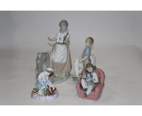 Three Nao figurines and one Royal Doulton "Caught One"