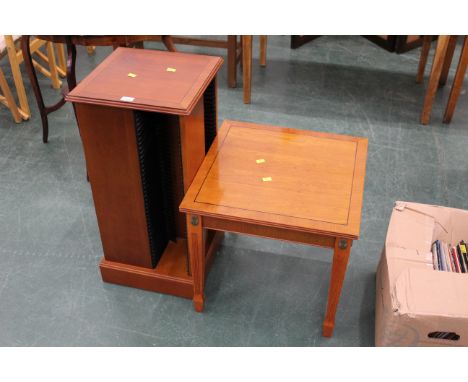 Yew wood occasional table and similar revolving CD rack 