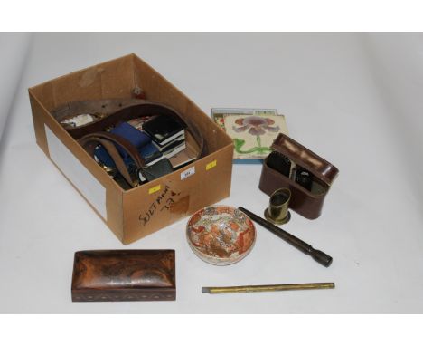 Box of decorative floral tile, leather belt, oriental bowl and vintage shaving set etc