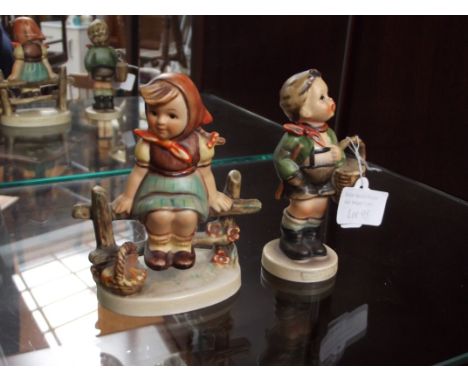 Two Hummel figures