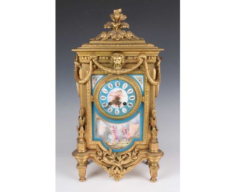 A late 19th century French gilt spelter and porcelain mantel clock with eight day movement striking on a bell, the porcelain 