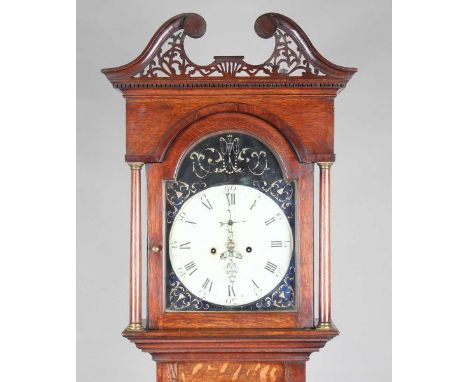 A George III oak longcase clock with eight day movement striking on a bell, the painted breakarch dial with black Roman hour 