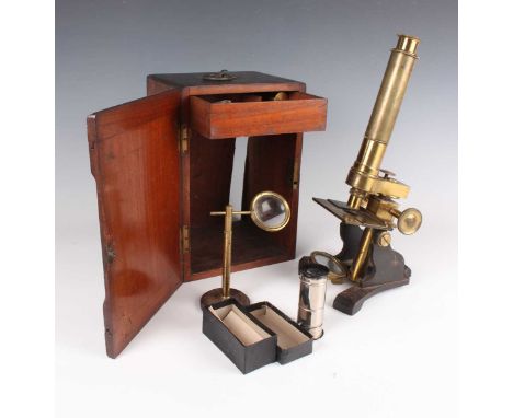 A Victorian lacquered brass monocular microscope, signed 'R. Field &amp; Son Birmingham' and numbered '698', with rack and pi