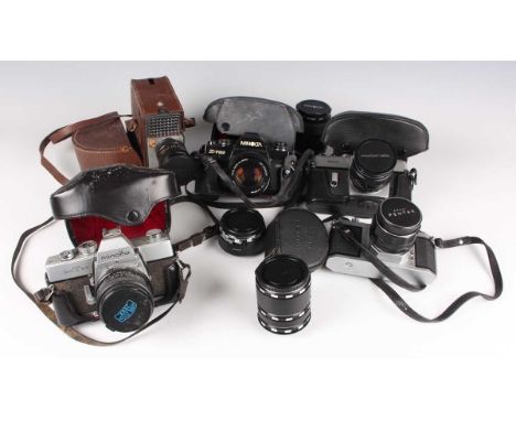 A collection of assorted cameras and accessories, including a Pentax S1a camera with Super-Takumar 1:2/55 lens, a Pentax SPF 