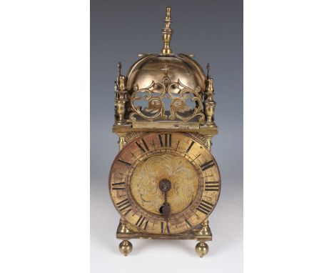 A mid-17th century style brass lantern timepiece with Coventry Astral movement, the chapter ring with black Roman hour numera