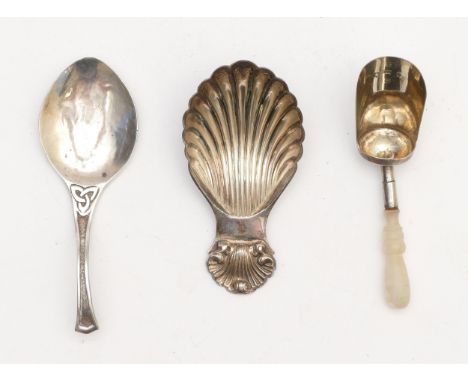 A Scottish Arts &amp; Crafts silver caddy spoon by Charles Creswick, Edinburgh 1951, hammered finish, a William IV silver sho