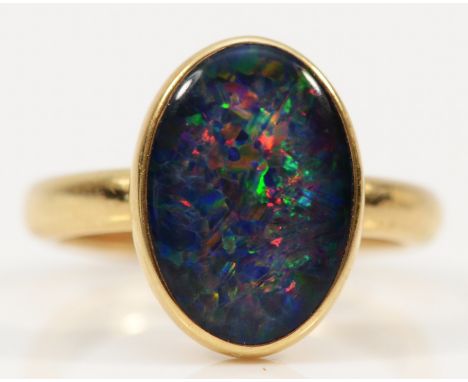 A 9ct gold opal triplet dress ring, 14 x 10mm, L, 4.1gm 