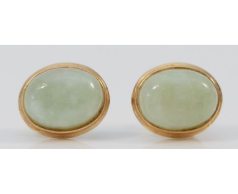 A pair of 9ct gold cabochon cut jade earrings with scroll backs, 10mm, 1.5g 