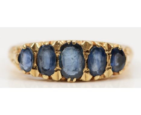 A Victorian style 9ct gold five stone blue stone ring, carved claw set, P, 3.3gm 