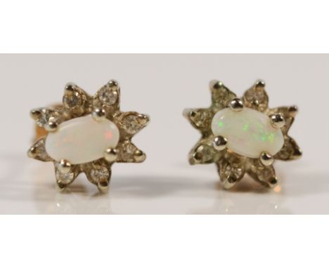A pair of 9ct gold diamond and opal cluster earrings with scroll backs, 8mm, 1.4g 