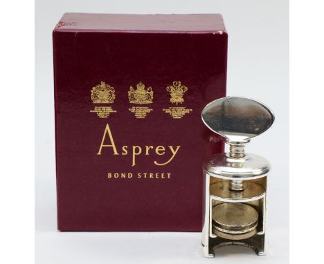 An electroplated champagne bottle opener, with stopper, offered in an Asprey box, together with An American electroplated let