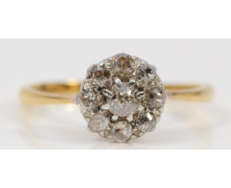 An 18ct gold and old cut diamond cluster ring, O 1/2, 2.6 
