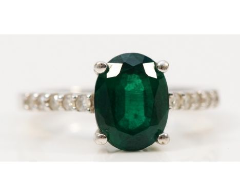 A 9ct gold green gemstone and diamond dress ring, 9mm gemstone length, I, 2.9g 