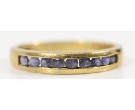 A 9ct gold iolite half eternity ring, K 1/2, 1.6g 