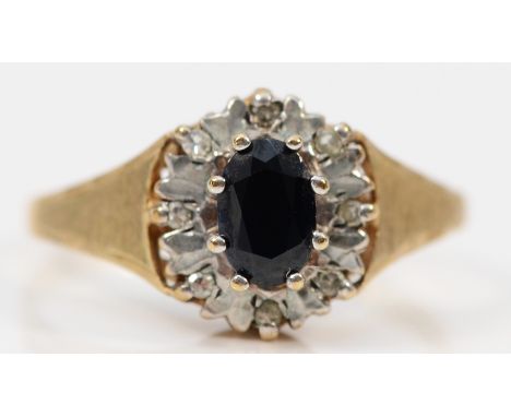 A 9ct gold diamond and sapphire oval cluster ring, N, 2.1g 