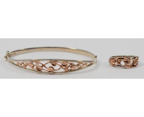 Clogau, a silver and rose gold bangle, 60 x 55 and a matching ring, M, 15gm 