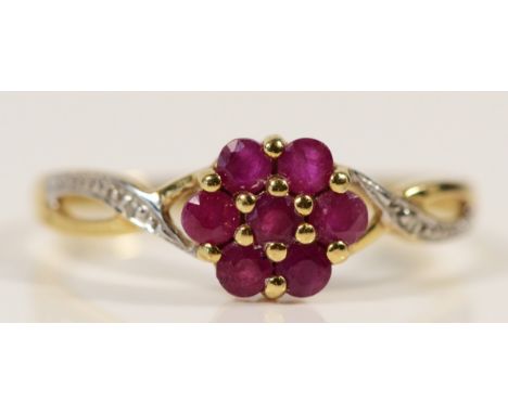 A 9ct gold ruby and diamond cluster ring, P, 1.6g 