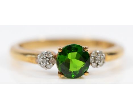 A 9ct gold diopside and diamond dress ring, O, 2g 